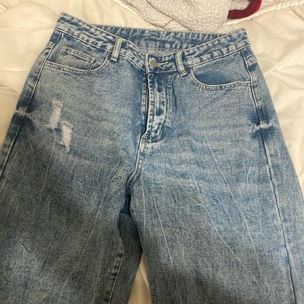 medium wash blue jeans